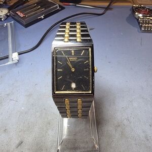 Seiko Men's Watch 7N39-5A29 Quartz Gold Black Stainless Steel Tank 38x26mm